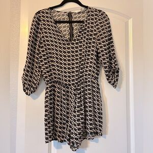 Orange and black romper